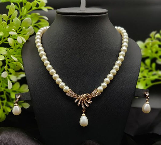Imported Pearl Necklace Set With Radiant Pendant & Earrings